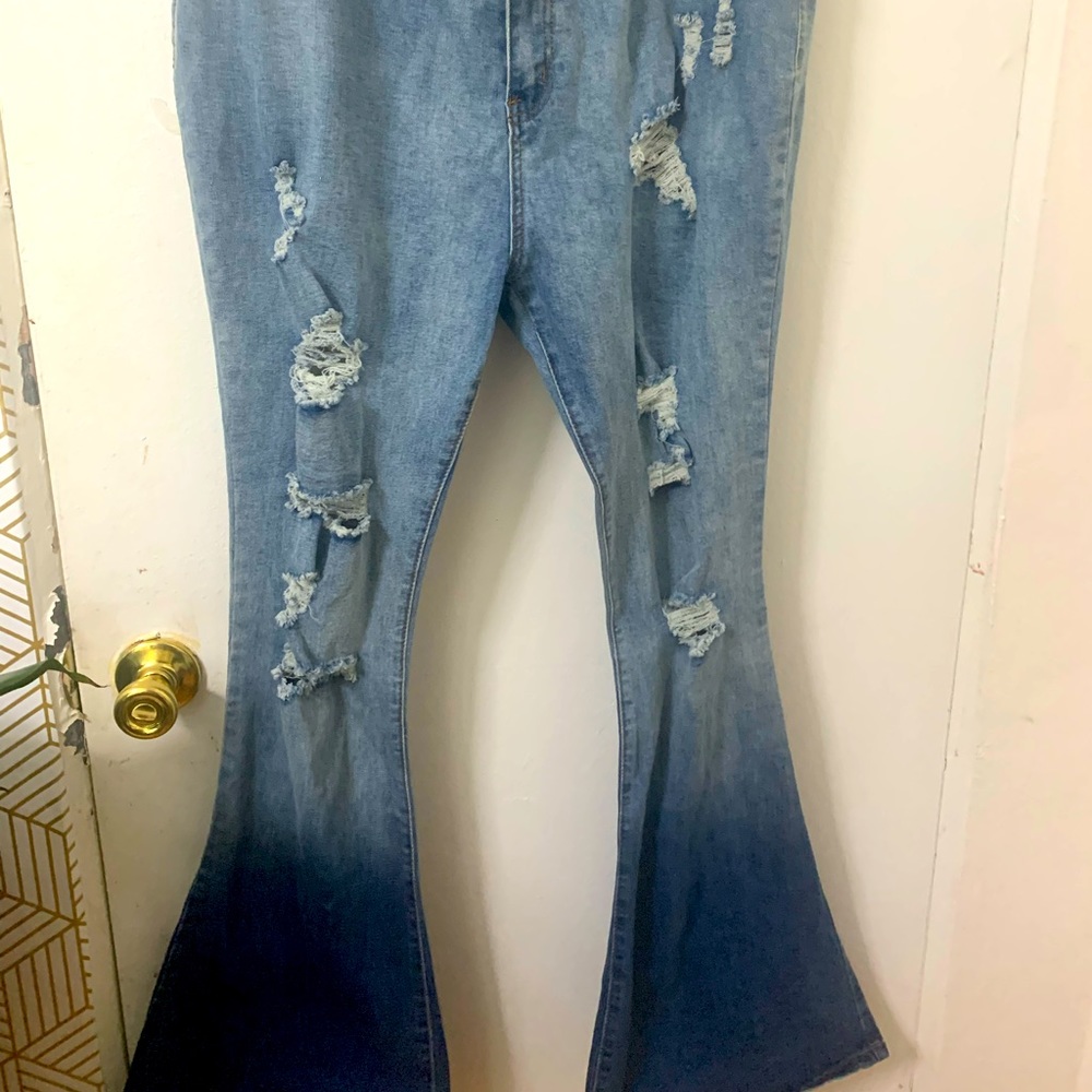 Boot cut Jeans with rips